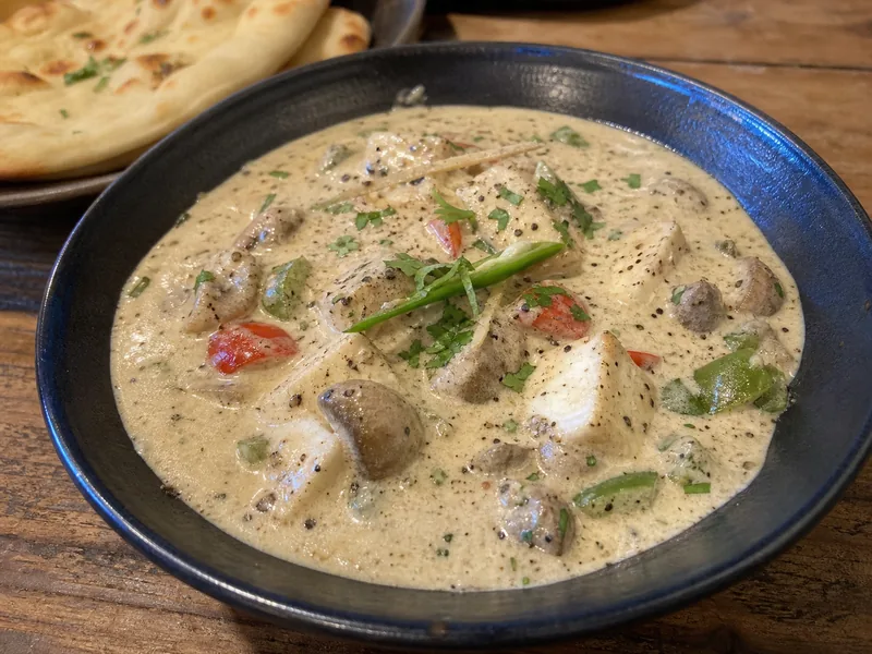 Danie Kali Mirch Malai